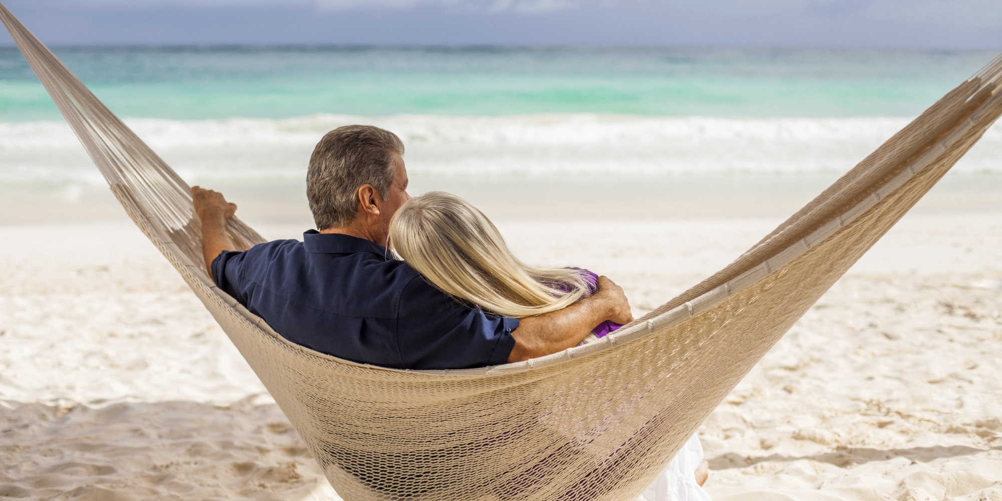 early retired beach couple full banner